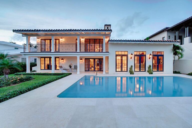 Spacious living area with natural light, high-end finishes, and expansive views through large windows